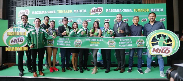 At the media launch of 42nd National MILO Marathon, at center is Solenn Heusaff, celebrity and fitness enthusiast.