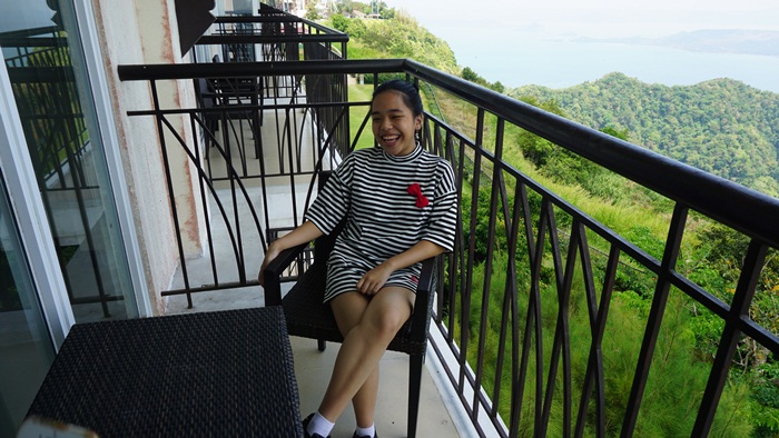 table and chairs at the balcony to while away time, chat overlooking the Taal Lake