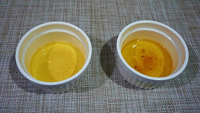 After cooking first batch of chicken - (Left) - Jolly Claro Palm Oil (Right) - Another major brand of palm oil. Jolly Claro is clearer, so Oilinis