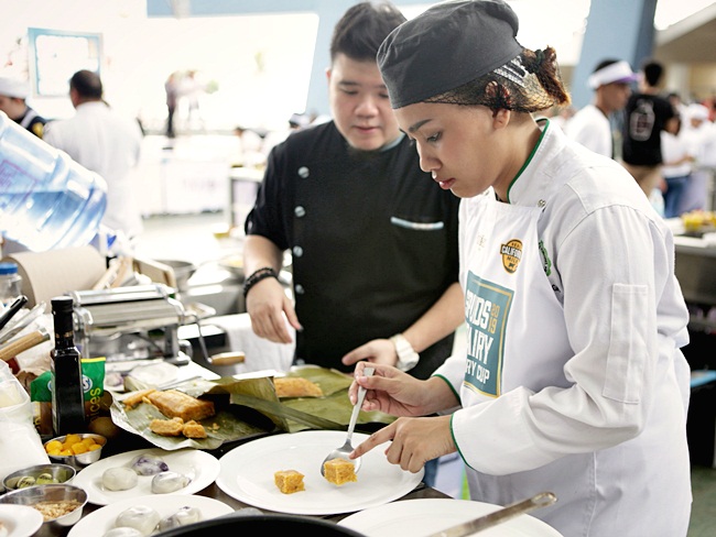 Seen here while plating are Chef Sharwin Tee with his partner from
DLSU-Dasmarinas Meriel Salenga.

