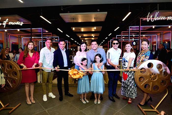 From L-R) SM Supermalls Operations Regional Manager Lea Sta. Ana, SM Cinema VP for Operations Edwin Nava, Quezon City District 5 Congressman Alfred Vargas (and family), Mark Anthony Fernandez, SM Cinema VP for Marketing Ruby Ann Reyes, and SM Supermalls Central Region Vice President for Operations and Senior Assistant Johanna Rupisan officially opened the refurbished cinema with a ribbon-cutting ceremony last November 22.