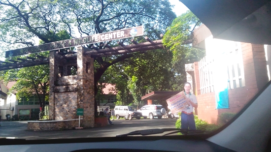Back entrance of Ninoy Aquino Parks and Wildlife where the parking area is located.